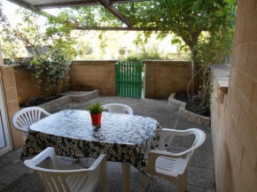 Bilocale con veranda giardino al mare in Baia Verde Gallipoli